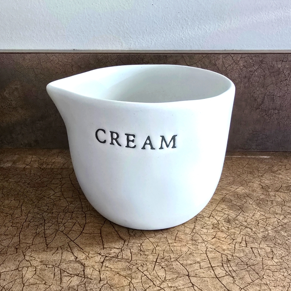 Hearth & Hand with Magnolia stoneware Cream canister.